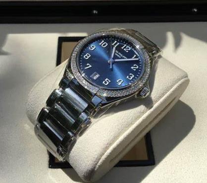 The blue dial fake watch has a date window.